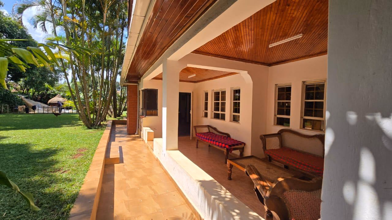 Spacious 4-Bedroom Home with Guest Wing & Garden