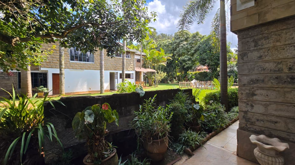 Spacious 4-Bedroom Home with Guest Wing & Garden