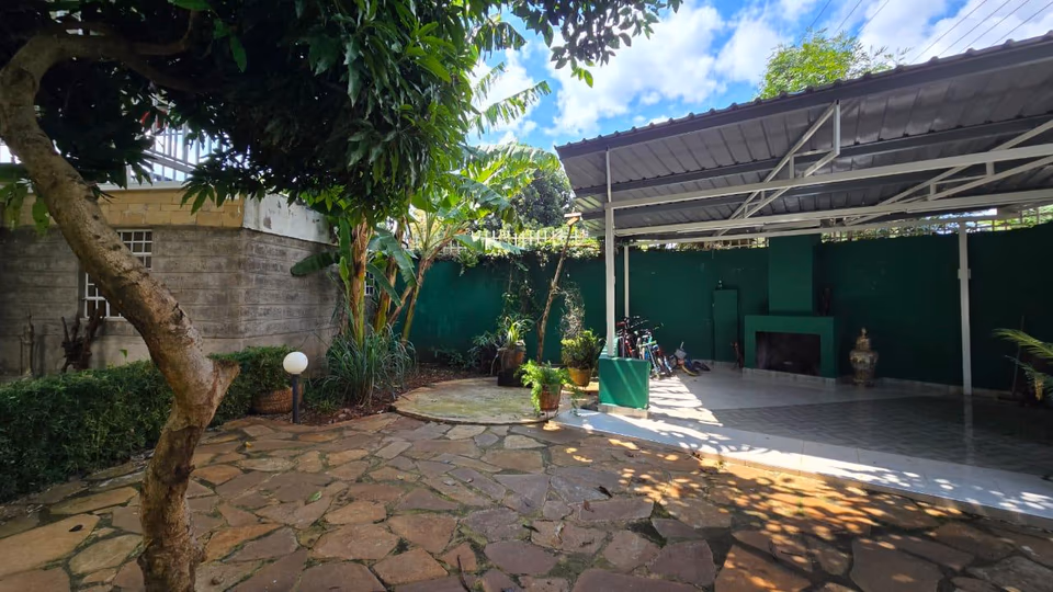 Spacious 4-Bedroom Home with Guest Wing & Garden
