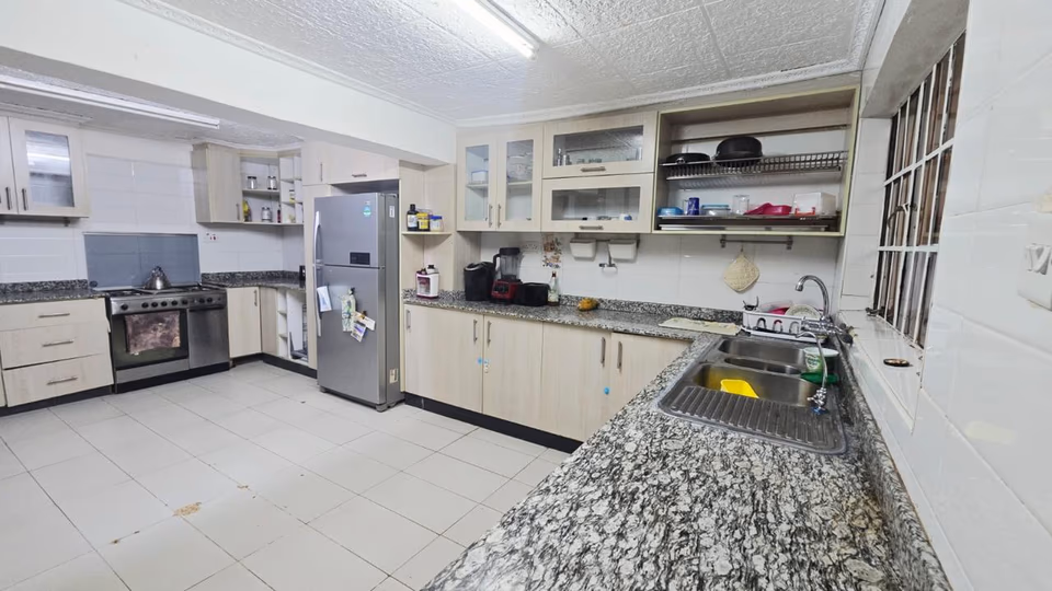 Spacious 4-Bedroom Home with Guest Wing & Garden