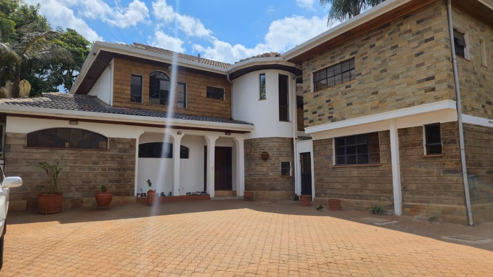 Spacious 4-Bedroom Home with Guest Wing & Garden